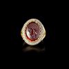 A ROMAN PORTRAIT INTAGLIO OF 'AELIUS' 2ND CENTURY AD, MOUNTED IN A 20 CENTURY GOLD RING, 18K WITH DIAMOND