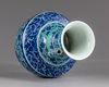 A Chinese gasoline green ground blue and white vase