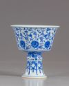 A Chinese blue and white lanca character stem cup