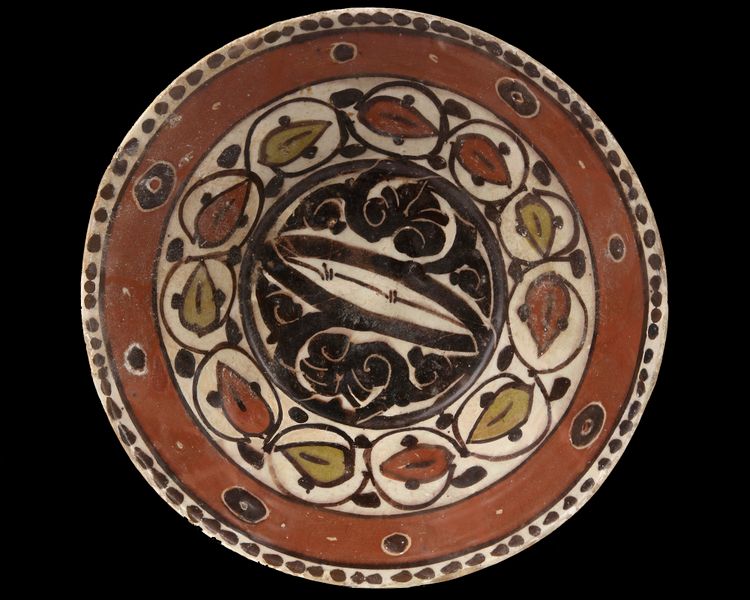 A SAMANID SLIP-PAINTED POTTERY BOWL, PERSIA, 10TH CENTURY