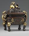 A Chinese parcel gilt twin 'qilin' handled rectangular censer and cover