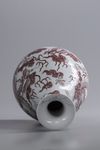 A Chinese blue and white and underglaze copper red 'dragon' pear-shaped vase, yuhuchunping