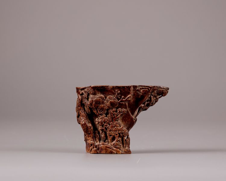 A Chinese aloeswood 'scholar and pine' libation cup