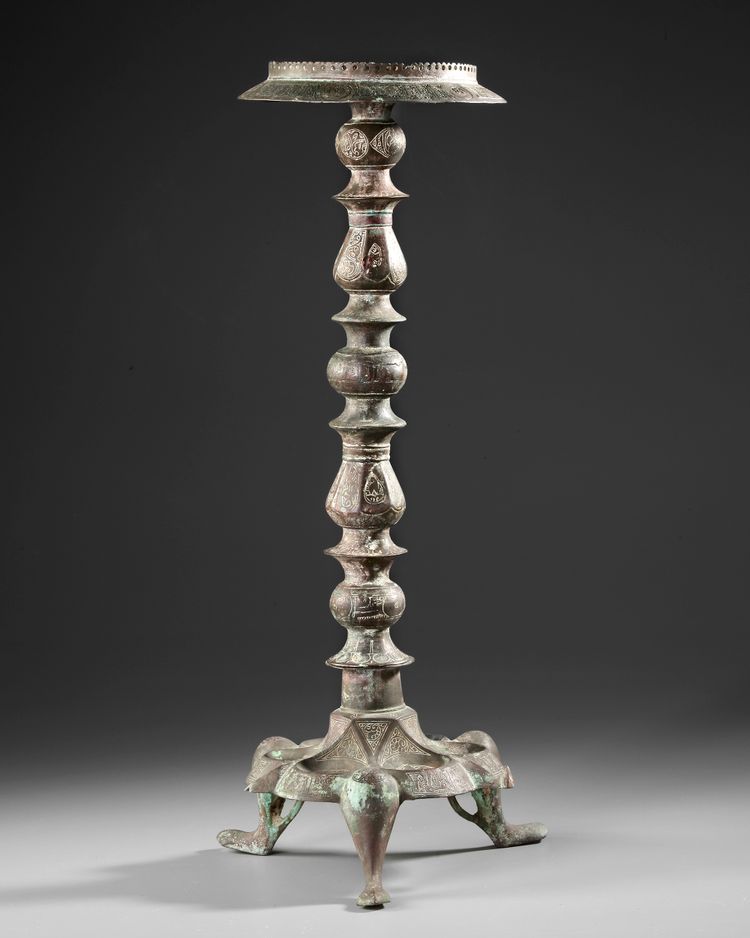 A KHORASAN COMPOSITE BRONZE LAMP STAND, PERSIA, 12TH CENTURY