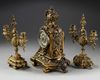A NEO-RENAISSANCE STYLE BRONZE CLOCK AND CANDLELABRA SET, LATE 19TH CENTURY