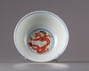 A wucai dragon and phoenix bowl