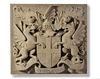 A SCULPTED LIMESTONE ARMORIAL PANEL, SECOND HALF 20TH CENTURY