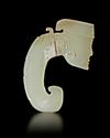 A WHITE JADE DRAGON PENDNT WITH A HUMAN HEAD, CHINA, SHANG DYNASTY