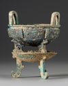 A CHINESE ARCHAIC BRONZE RITUAL FOOD VESSEL (CHANG ZI DING), EARLY WESTERN ZHOU DYNASTY 1046-771 B.C.