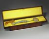 A CHINESE CLOISONNÉ ENAMEL RUYI-SCEPTRE IN A JADE PLAQUE INSET WOOD BOX, CHINA, 19TH CENTURY