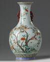A Chinese famille rose ‘pomegranates’ bottle vase