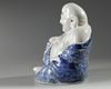 A Chinese blue and white figure of Budai
