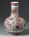 A CHINESE IRON-RED BOTTLE VASE