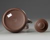 A Chinese yixing teapot and cover