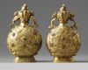 A pair of Chinese hardstone-inlaid gilt bronze 'dragon and phoenix' moonflasks