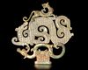 A GILT BRONZE MOUNTED OPENWORK DOUBLE DRAGON JADE HENG, CHINA, WARRING STATES