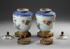 A PAIR OF EUROPEAN LIDDED JARS IN KAKIEMON STYLE, 19TH CENTURY
