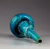 A Chinese turquoise-glazed 'dragon' bottle vase