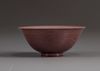 A Chinese aubergine-glazed dragon bowl
