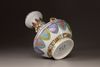 A polychrome porcelain vase