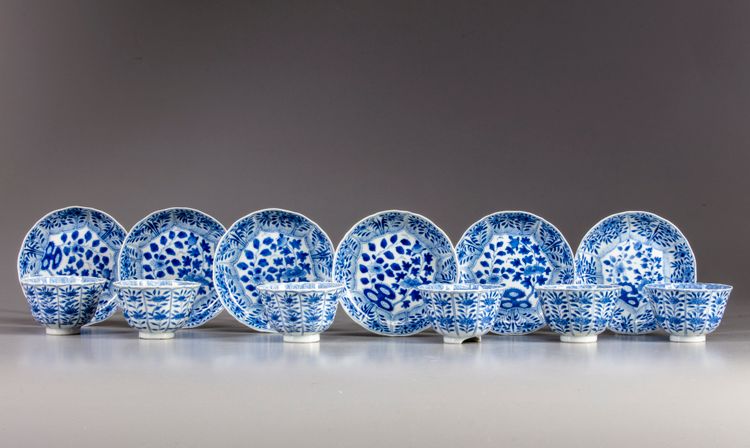 Six Chinese blue and white cups and saucers