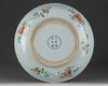 A Chinese famille verte 'dragon & warrior' charger