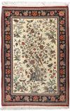 A FINE GHOM RUG