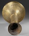 A QAJAR PIERCED BRASS CANDLESTICK, PERSIA, 19TH CENTURY