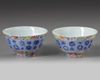 A pair of Chinese famille rose bowls