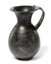 A BUCCHERO NERO OINOCHOE, 6TH CENTURY BC