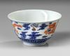 A CHINESE BLUE AND WHITE IRON-RED DECORATED 'DRAGON' BOWL, SIX-CHARACTER JIAQING MARK AND OF THE PERIOD (1796-1820)