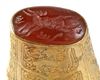 A GOLD-PLATED RING WITH CARNELIAN INTAGLIO, 19TH CENTURY