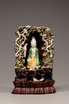 A Chinese green, yellow, and aubergine-glazed grotto