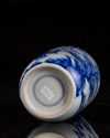A small Chinese blue and white 'figural' rouleau vase