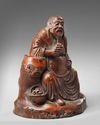 A CHINESE BAMBOO CARVING OF BUDAI, 19TH-20TH CENTURY