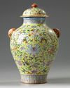A Chinese yellow-ground famille rose 'Eight Immortals' vase and cover