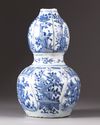 An unusual Chinese blue and white double-gourd vase