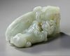 A CHINESE CELADON JADE CARVING OF A WATER BUFFALO GROUP, 19TH-20TH CENTURY