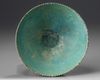 An Islamic turquoise glazed bowl