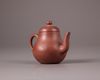 A Chinese yixing teapot and cover
