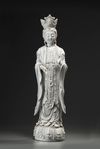 A LARGE CHINESE BLANC DE CHINE FIGURE OF GUANYIN, 19TH-20TH CENTURY
