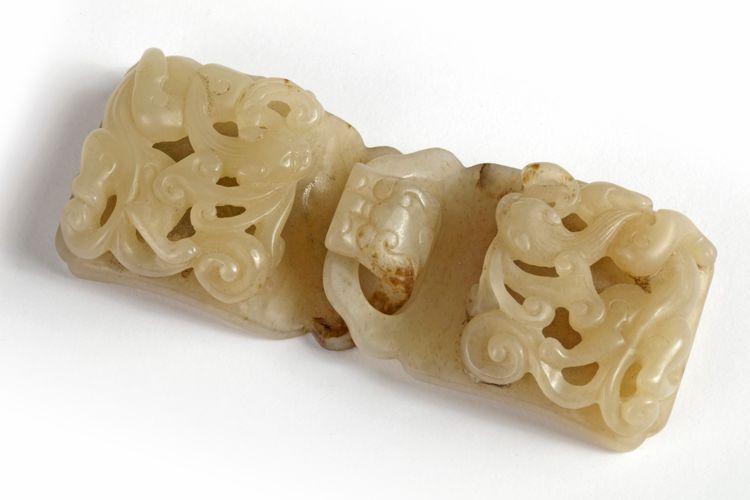 A Chinese celadon jade 'chilong' belt buckle