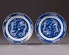 A pair of Chinese blue and white 'dragon' dishes