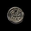 AN EARLY ISLAMIC GLASS WEIGHT OF DIRHAM