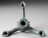 A BYZANTINE THREE -SPOUTED BRONZE OIL LAMP, CIRCA 4TH-5TH CENTURY A.D.