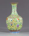 A Chinese famille rose lime green vase