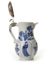 A SILVER MOUNTED CHINESE BLUE AND WHITE MOULDED MILK JUG, KANGXI PERIOD (1662-1722), THE SILVER MARKED 18TH CENTURY