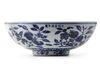 A CHINESE BLUE AND WHITE FRUIT BOWL, QING DYNASTY (1644-1911)