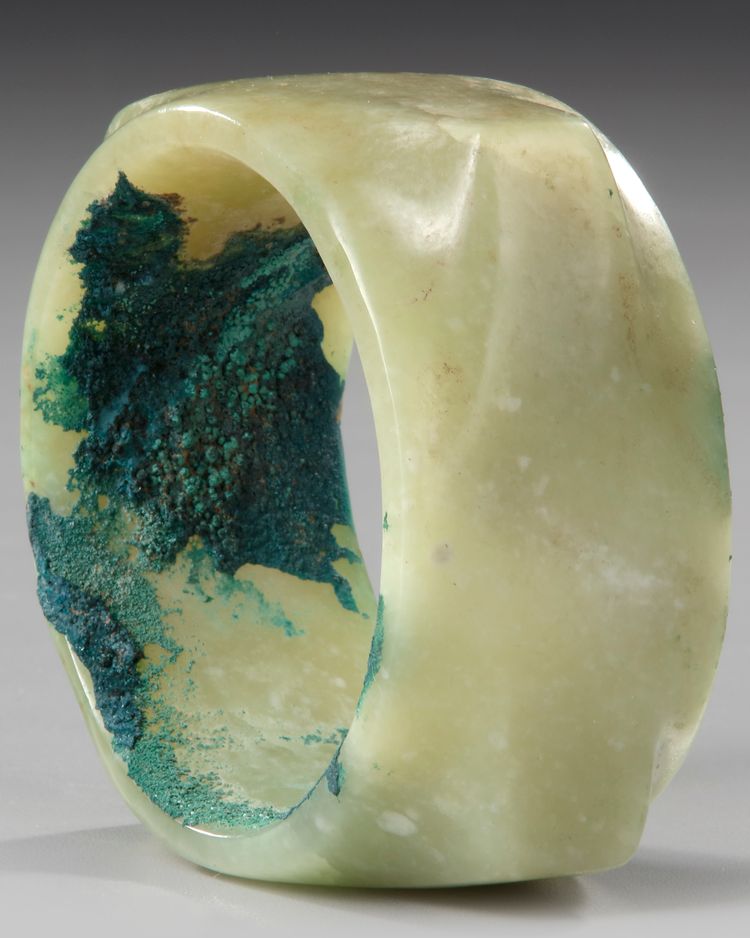 A CHINESE CELADON JADE ARCHAISTIC CONG, MING DYNASTY (1368-1644)