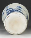 A CHINESE TRANSITIONAL STYLE BLUE AND WHITE BEAKER GU VASE